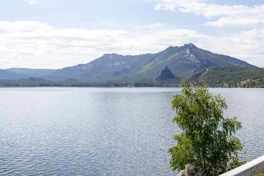 Scenic view of lake, forest and mountains in Borovoe, Kazakhstan. Natural landscape, travel and tourism concept.