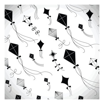 A seamless pattern featuring various black and white kite with long flowing tails on a light background
