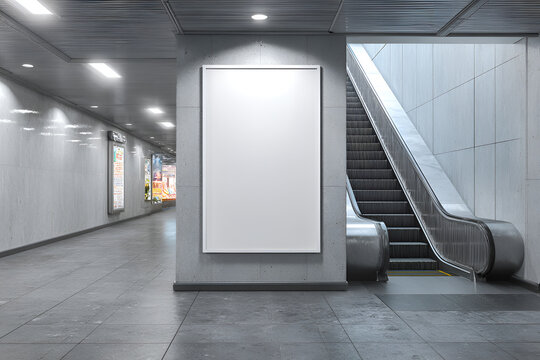 Modern subway station corridor featuring a blank white poster, illuminated walkways, and escalator access