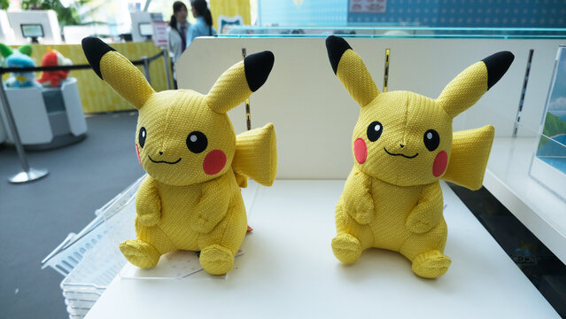 Singapore on 14 April 2026: two cute Pikachu plush dolls displayed on a shelf at the Pok&eacute;mon Center in Jewel Changi Airport, Singapore