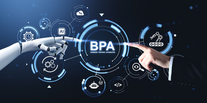 Robotic hand and human hand interacting with futuristic BPA business process automation interface on digital technology background concept..
