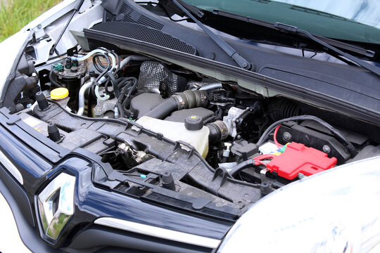 Vinnytsia, Ukraine; May 30, 2026. White Renault Kangoo open hood. Close up Renault Kangoo cdi diesel engine. Modern сar close-up engine, front top view, show all engine parts. Detailed view of an ope