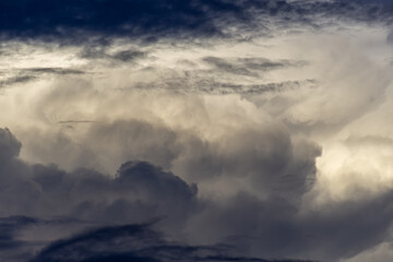 Naklejka premium Cloudscape has been developing in gorgeous form. The vast blue sky and clouds sky background.