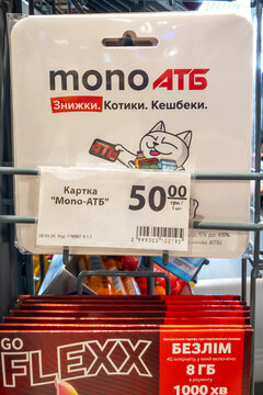 Kyiv, Ukraine, June 1, 2026: Mono atb bank card package displayed on a supermarket shelf, offering discounts and cashbacks for shoppers.