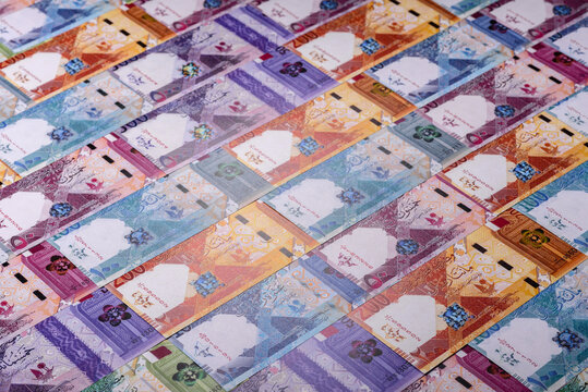 Qatar paper money, the Qatari riyal as a tool for financial transactions and trade. Qatari money
