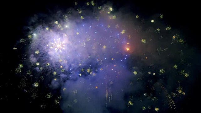 Colorful colorful fireworks explode in the night sky. Slow motion. Wonderful real fireworks. Large-scale use of pyrotechnics on a holiday. 4k footage