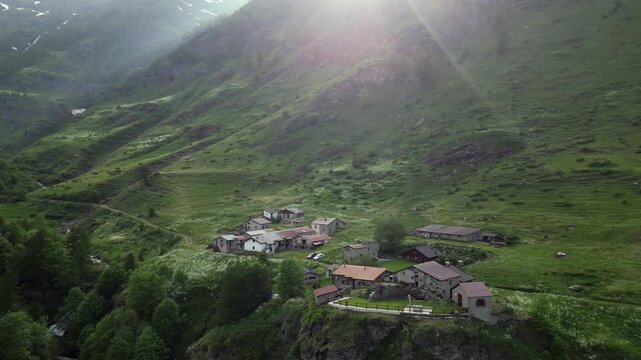 Europe, Italy, Alpeggio Balma di Rodoretto is a small mountain village with a stream of water due to the melting of the glacier ice - climate change and global warming save the planet