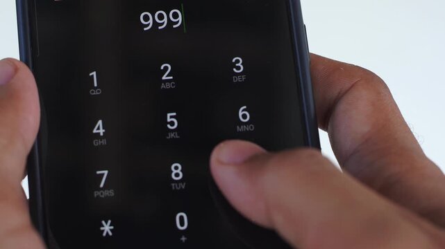 Emergency and urgency, dialing 999 on smartphone screen. This number is used in the United Kingdom, Ireland, Poland, Singapore, Malaysia and Hong Kong.