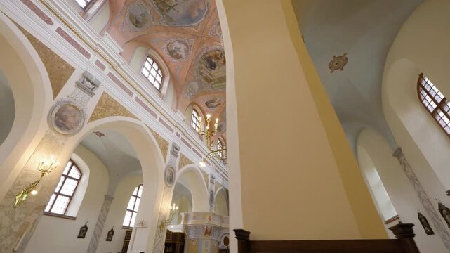 Vilnius, Lithuania &ndash; June 19, 2026: Cinematic slide inside the Church of the Assumption of the Blessed Virgin Mary