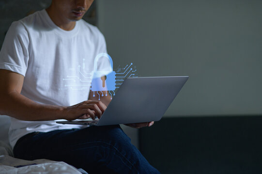 Secure Network Hologram Displayed Above Laptop in Modern Setting