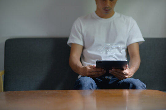 Man Interacting with Holographic Network Icon on Digital Device