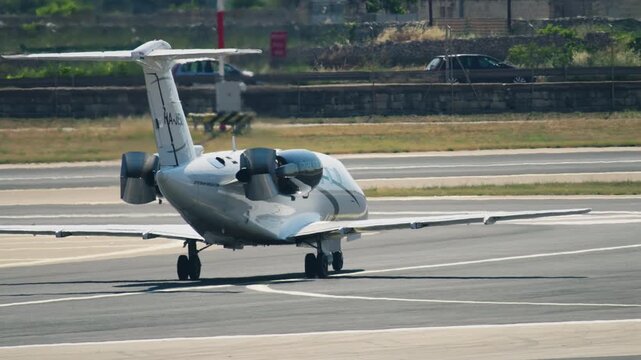 Private business jet taxiing on airport runway showcasing luxury air travel fast transportation executive aviation and convenient flight experience