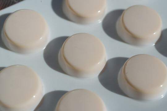 White medicine pills closeup, macro tablets