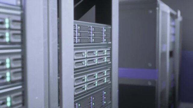Tight view of server drive bays stacked drives with green status lights, metallic front panels, ventilation holes, polished rack rails, ambient cool tone