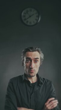 Funny Man Waiting, Frowning at Clock, Comically Wondering