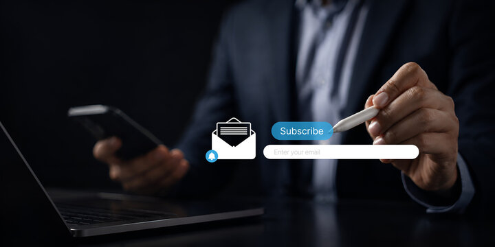 newsletter  signup  form  email  subscribe  cta  Person using digital device with newsletter subscription form and CTA button  representing email marketing  lead generation  and online communication.