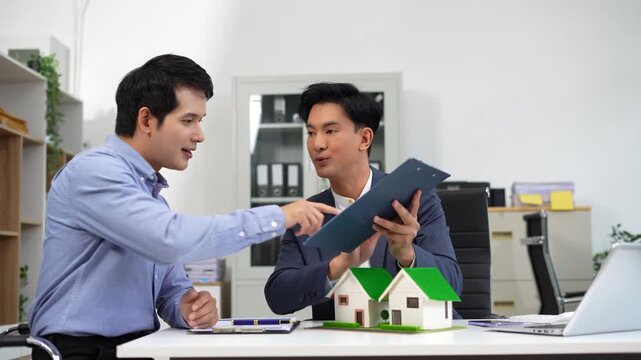 House model with agent asking costumer for contract to buy, get insurance or loan real estate or property.