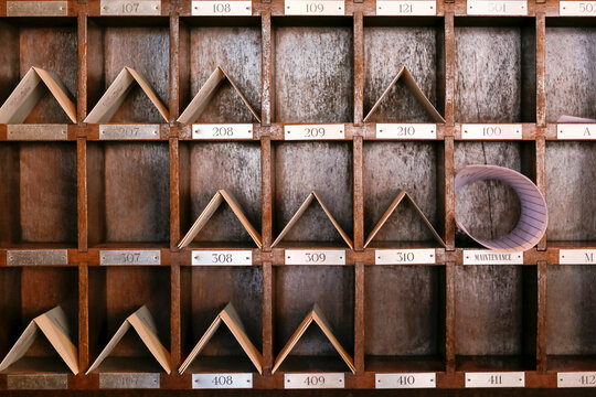 Vintage hotel key and mail cubbies in an old western building