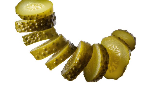 Isolated green dill pickle slices arranged in a curved line, showing texture and detail