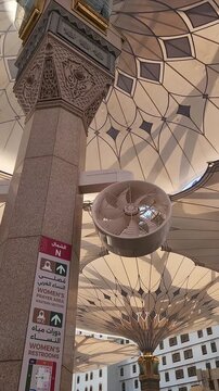 The umbrella of nabawi. The image shows the large, retractable umbrellas at Al-Masjid an-Nabawi in Medina, Saudi Arabia. These umbrellas provide shade to the mosque s courtyard.
