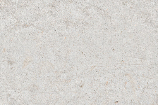 Neutral textured white wall background for various design applications.