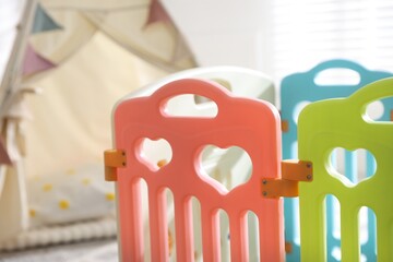 Beautiful playpen and wigwam in child's room, closeup © New Africa
