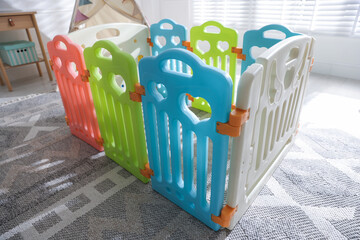 Beautiful playpen and wigwam in child's room, closeup © New Africa