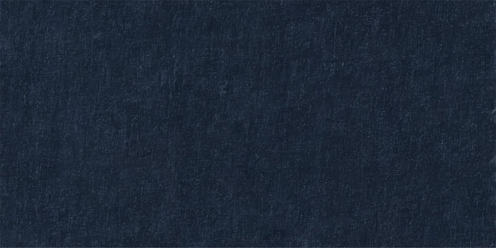 A detailed closeup of dark blue denim fabric texture showcasing the rugged cotton canvas pattern of classic jeans clothing as a stylish fashion material backdrop