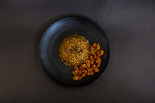 indonesia fried beef seasoned rice with fried tempe condiment served warmth for lunch