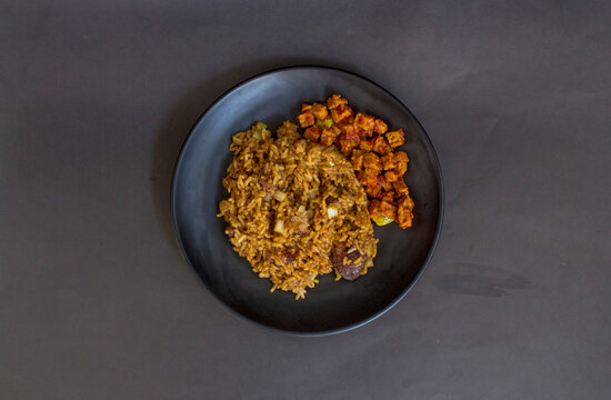indonesia fried beef seasoned rice with fried tempe condiment served warmth for lunch
