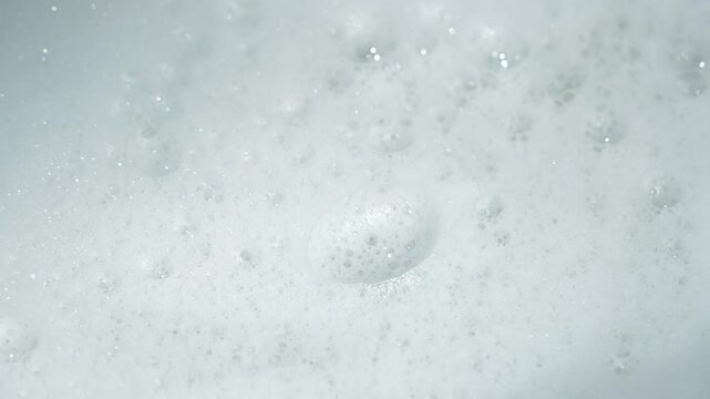 background of soap foam with bubbles, the concept of cleanliness and hygiene