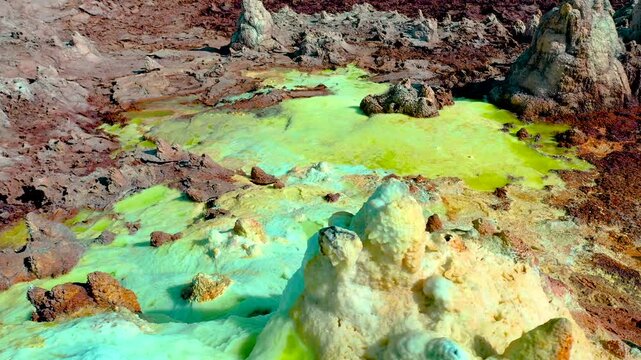 An aerial view of the vividly colored geothermal pools of the Dallol region in Ethiopia Danakil Depression