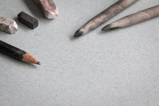 Art Supplies on Grey Paper