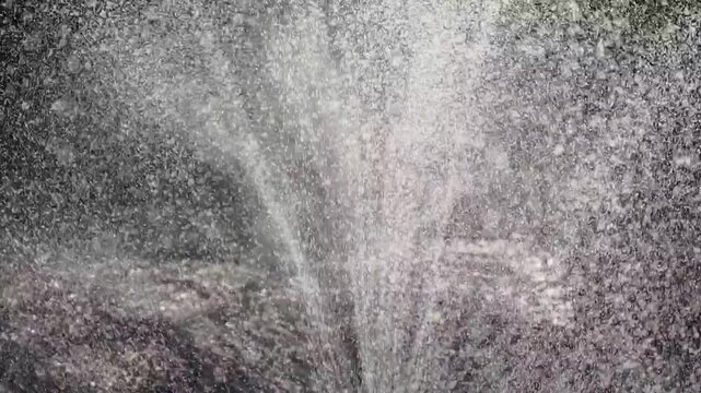 
Sprinkler slow motion back light water drops#001



