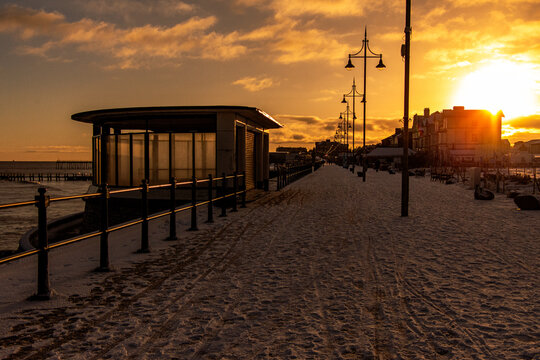 Snow-Covered Lowestoft Beach at Sunset, Suffolk Coast, England