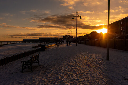 Snow-Covered Lowestoft Beach at Sunset, Suffolk Coast, England