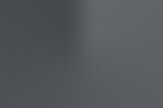 Minimalist abstract dark charcoal gray background texture featuring subtle dual light beams creating smooth atmospheric illumination and dense photographic grain