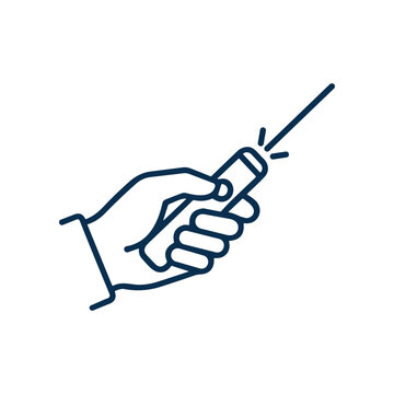 Hand holding a laser pointer device.