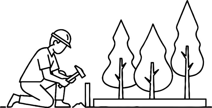 Gardener planting young trees with hammer and protective gear.