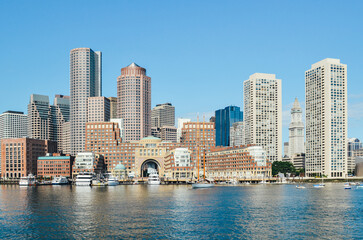 Fototapeta premium Urban buildings along the waterfront in Boston