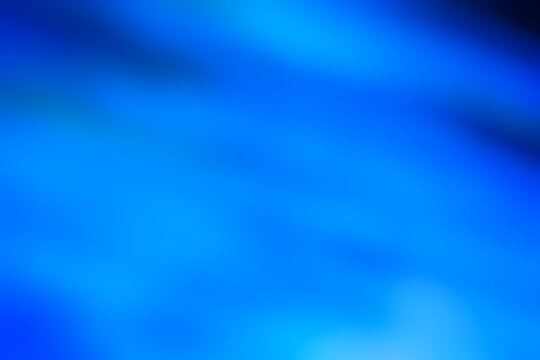 Abstract blue flowing fabric Subject flowing fabric Predicate flows Object vibrant blue colors