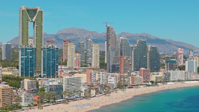 Highrise buildings and beach in Benidorm aerial view Spain.