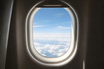 Obraz premium Airplane Window View Above Soft White Clouds