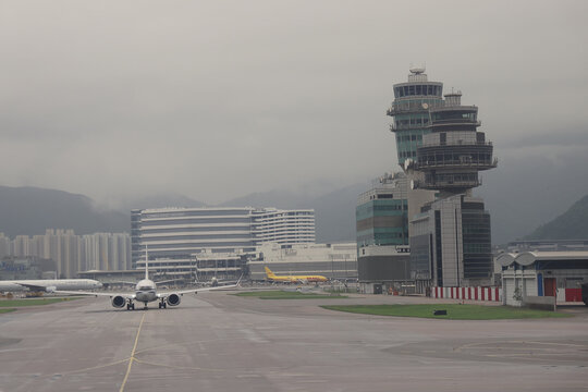 April 24 2026 Passenger Aircraft Parked At Terminal With Mountains