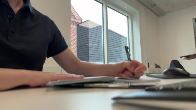 Person working at desk office setup