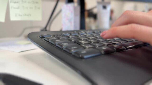 Person working at desk office setup