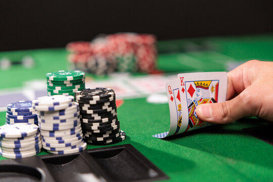 Two kings of playing cards on the poker table. A pair of kings is a strong combination in the poker game