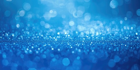 Obraz premium Luminous blue sparkling background for holiday celebrations