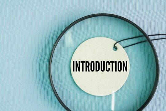 Paper with the word introduction. the action of introducing something. the act of bringing something into use for the first time, presenting someone to others