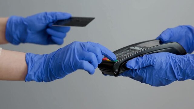Woman Using Credit Card Terminal for Secure Cashless Payment